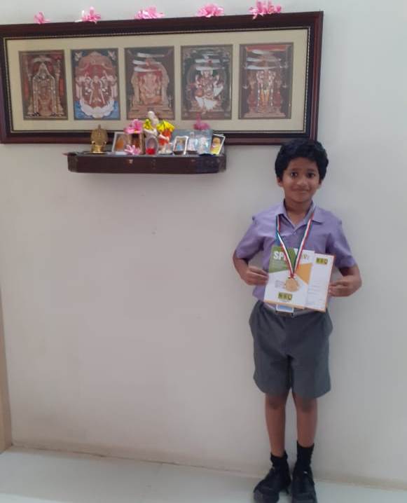 Akilan of class IV received gold medal in National Science Olympiad