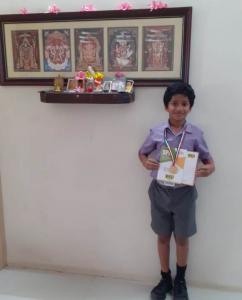 Akilan of class IV received gold medal in National Science Olympiad